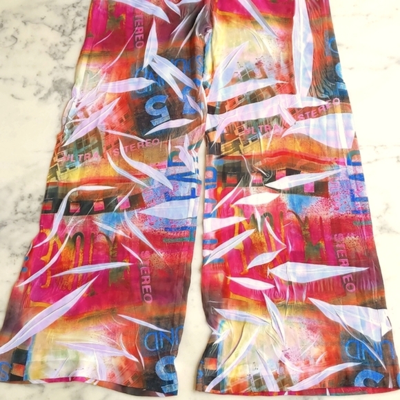 NWOT. Carolina Multi Color Pattern and Words Sheer Wide Leg Pant. - Picture 4 of 6